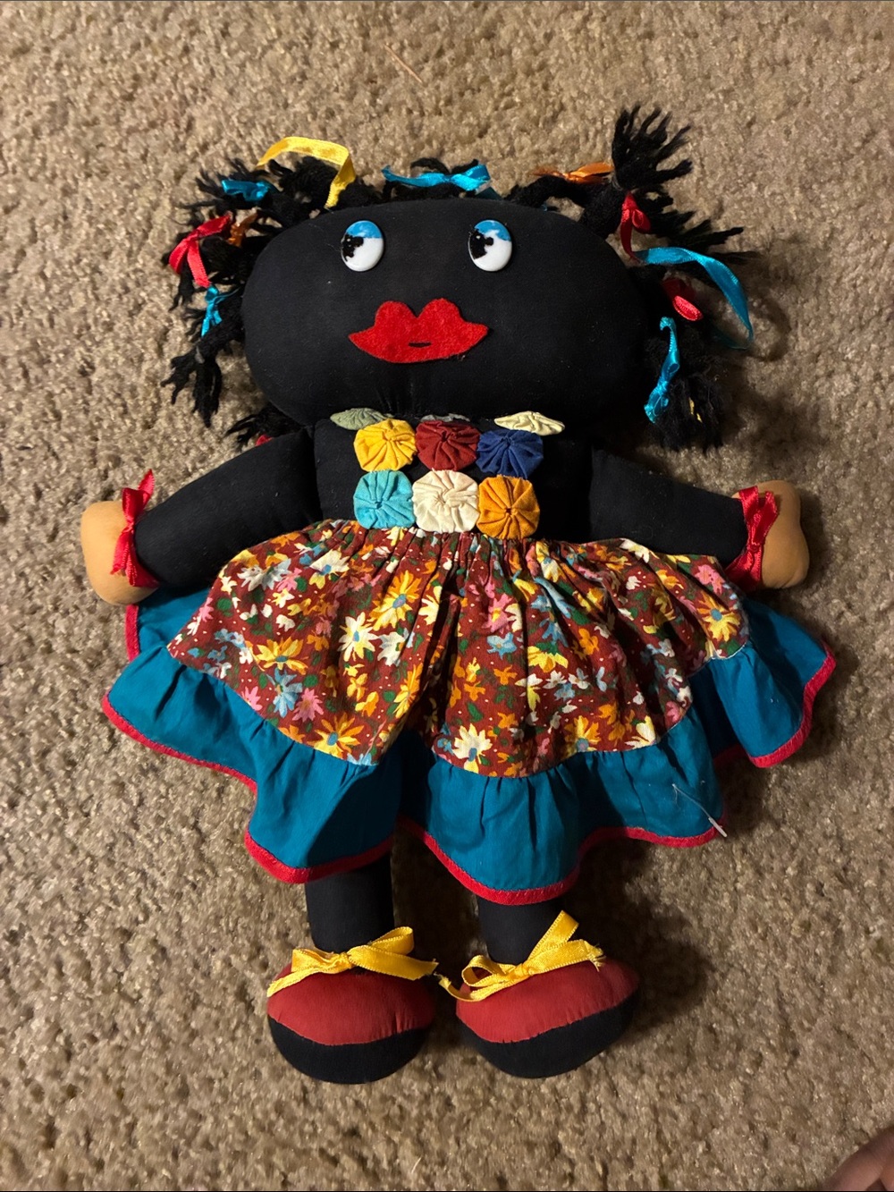 Handmade Black Fabric Doll with Floral Dress and Bright Accents